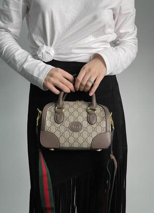 Сумка gucci из гладкой кожи в фирменной канве.5 фото