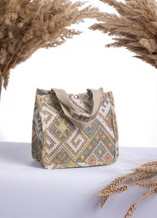 Мінімалістична компактна  сумочка в етно стилі