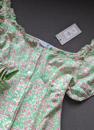 Ніжна коротка сукня в квітковий принт а-силует3 фото