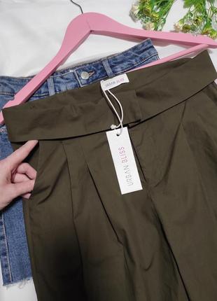 Стильные лёгкие брюки хаки со скидкой и карманами пояс с отворотом3 фото