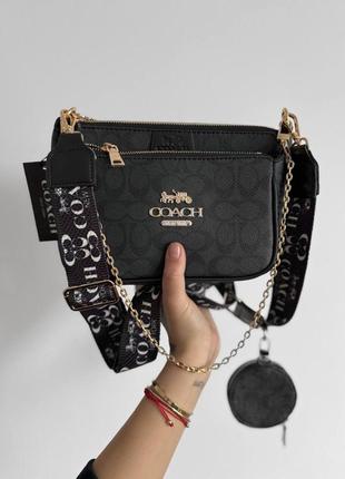 Жіноча сумка в стилі coach.