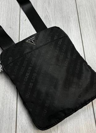 Оригінальна сумка guess glasic eco logo lettering crossbody bag men1 фото
