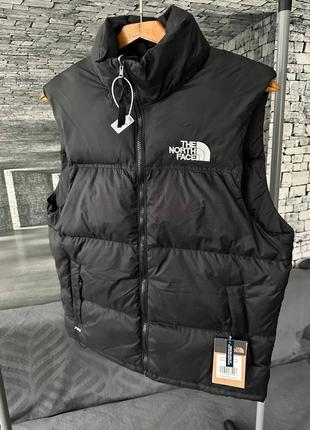 Желетка the north face с капюшоном