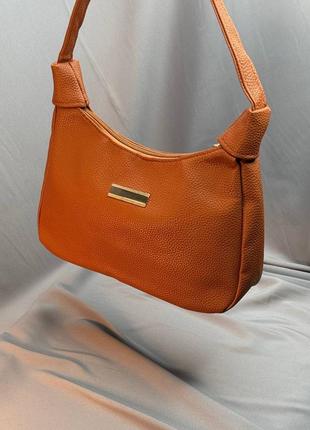 Классическая женская сумочка из экокожи.2 фото