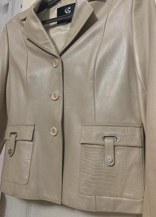 Продам пиджак , кожа 100% , новый . замеры длина 63 см , обхват груди 46 см , в самом низу ширина 42 см . рукав от шва 58 см6 фото