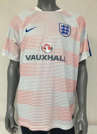 Футболка джерсі nike dri-fit england flash pre match top ll2 фото