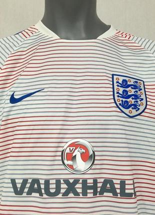 Футболка джерсі nike dri-fit england flash pre match top ll3 фото