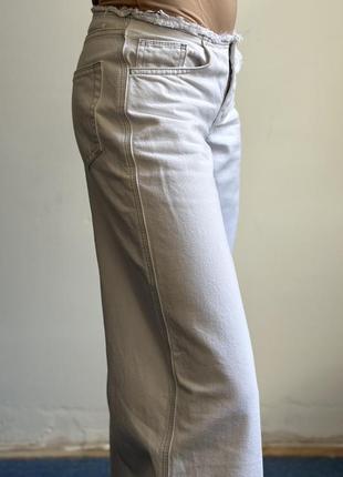 Білі джинси на низькій посадці кльош широкі розмір xs2 фото