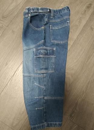 Удлиненные стильные джинсовые шорты для мальчика подростковые10 фото