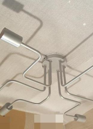 Люстра в стилі лофт срібного кольору.