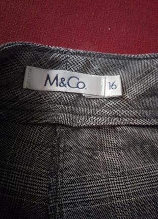 Стильні сірі штани в клітку з подворотами m&co10 фото
