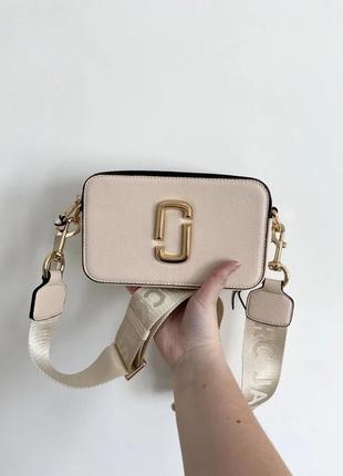 Mj logo light beige