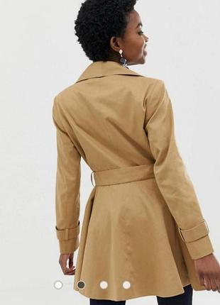 Жіночий тренч-плащ кльош