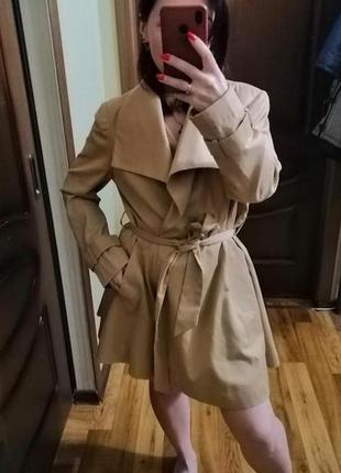 Жіночий тренч-плащ кльош