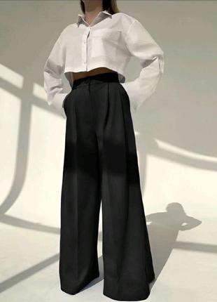 Палаццо брюки классические высокая прямые костюмка брюки асимметричные на запах кюлоты клеш посадка клеш классические обьмные являются прямые широкие кант2 фото