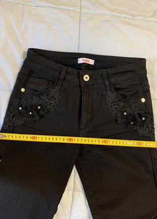 Чорні джинси прикрашені мереживом3 фото