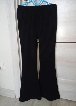 Модні чорні шкільні штани джинси брюки трикотажні кльош в рубчик висока посадка для дівчинки 9 років3 фото