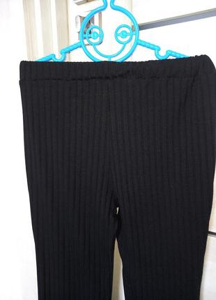 Модні чорні шкільні штани джинси брюки трикотажні кльош в рубчик висока посадка для дівчинки 9 років5 фото