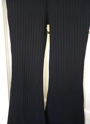 Модні чорні шкільні штани джинси брюки трикотажні кльош в рубчик висока посадка для дівчинки 9 років6 фото
