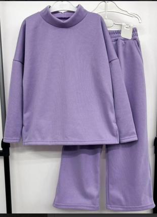 Стильні утеплені костюми з широкими штанами