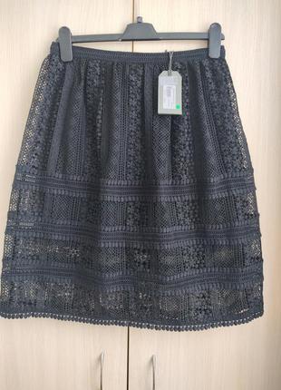 Шикарная брендовая кружевная юбка.3 фото
