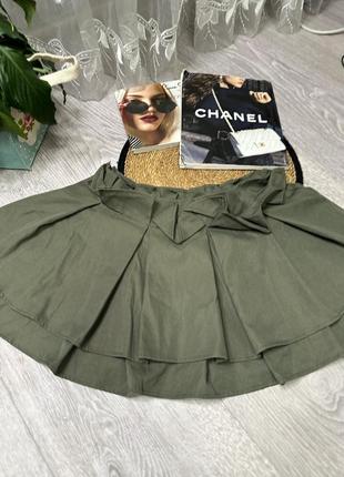 Мини-юбка цвета хаки с плиссированными деталями4 фото