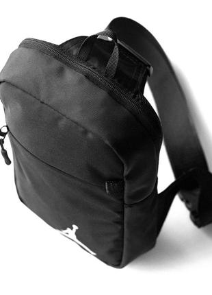 Мужская сумка слинг  через плечо барсетка jordan черная тканевая одно лямочная сумка джордан4 фото