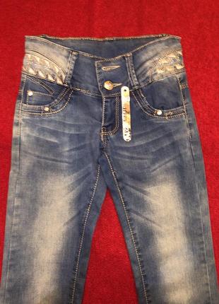 Джинсы на девочку