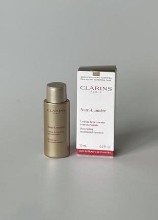 Антивікова зволожуюча есенція лосьйон сироватка для шкіри обличчя clarins nutri-lumiere renewing treatment essence