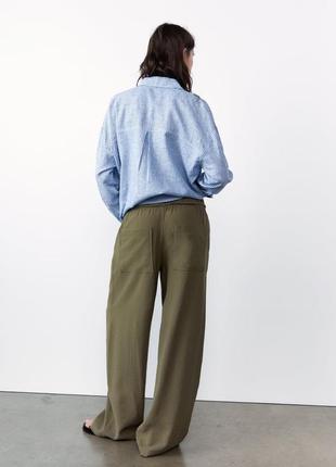 Широкие зеленые брюки zara new2 фото