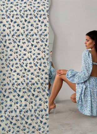 Жіноча літня стильна легка трендова блакитна сукня міді в квітковому принті5 фото
