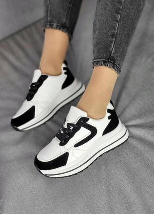 Бело-черные кроссовки9 фото