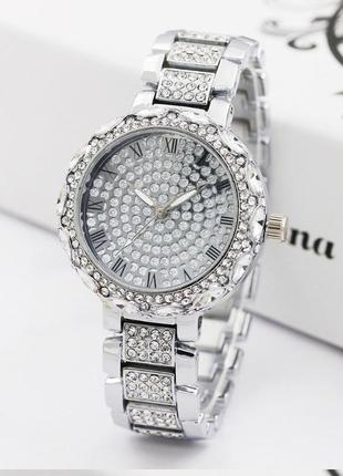 Жіночі наручні годинники з камінням4 фото