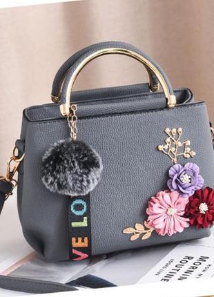 Жіноча міні сумочка з квіточками та хутряним брелоком. маленька сумка з квітами5 фото