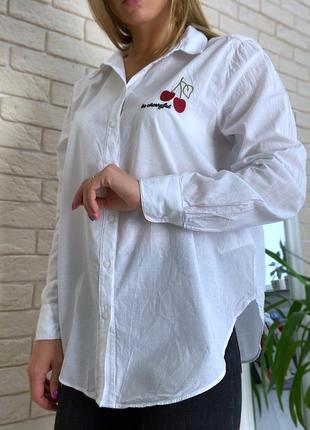 Белая катоновая блузка с вышивкой3 фото