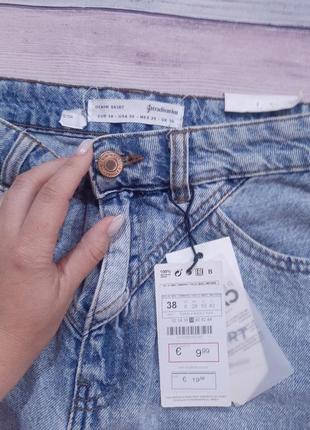 Короткая юбка из потертой джинсы7 фото