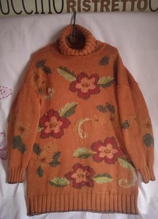 Красивный хлопковый свитер с фактурно выплетенными цветами.1 фото