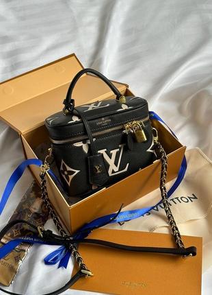 Сумка louis vuitton из зернистой кожи и фирменным тиснением.1 фото