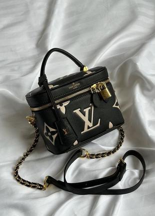 Сумка louis vuitton из зернистой кожи и фирменным тиснением.2 фото