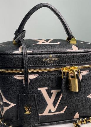 Сумка louis vuitton из зернистой кожи и фирменным тиснением.3 фото