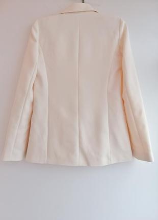Піджак жіночий персикового кольору4 фото