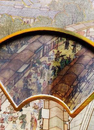 Блокнот з динамічним малюнком та комбінованою розміткою "людне містечко"