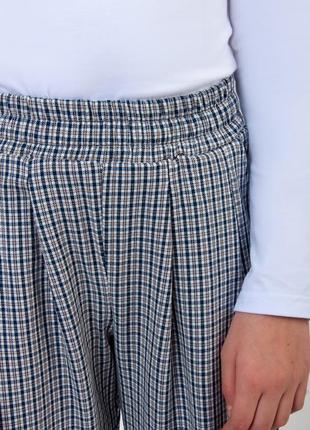 Стильные брюки с подворотами для школы, модные школьные брюки в клетку7 фото