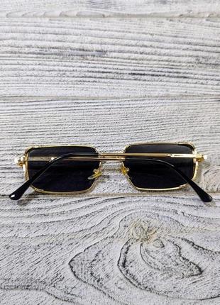 Солнцезащитные очки прямоугольные, унисекс, черные в золотистой металлической  оправе (без бренда)6 фото