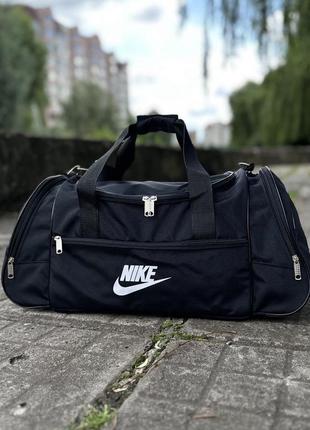 Небольшая спортивная дорожная черная сумка nike9 фото
