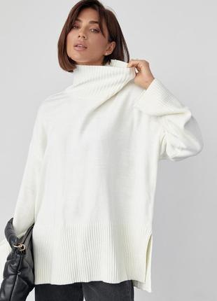 Женский вязаный свитер oversize с разрезами по бокам - молочный цвет, s (есть размеры)8 фото