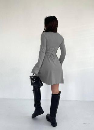 Стильное женское платье с шнуровкой на спине6 фото