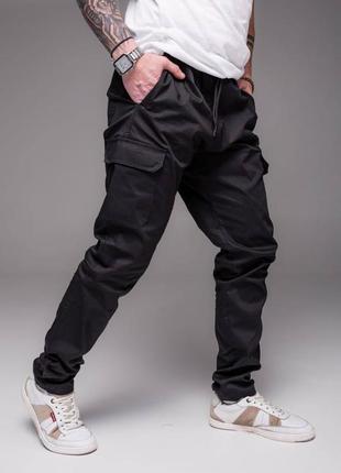 👖 штани джогери чорного кольору з накладеними кишенями2 фото