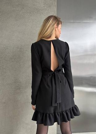 Изысканное черное стильное качественное трендовое элегантное платье с вырезом на спинке10 фото