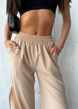 Жіночі легкі штани брюки вільного крою мод 0/05/мр/и 03 палаццо софт з розрізами  (42-44,46-48 розміри)6 фото
